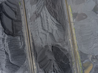 Mining excavator on the bottom surface mine. Brown coal deposits
