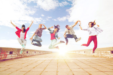 group of teenagers jumping
