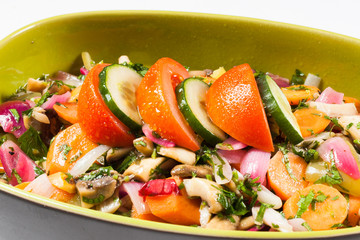 Fresh salad bowl filled with vegetables