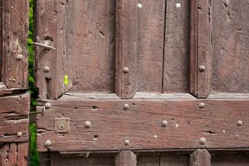 Rustic wooden door, slightly open