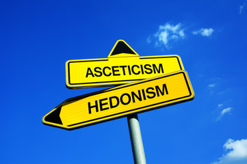 Asceticism vs Hedonism - Traffic sign with two options - decision for spiritual self-denial or for hedonistic enjoyment of bliss, delight and pleasures. Spirituality or moral decadence