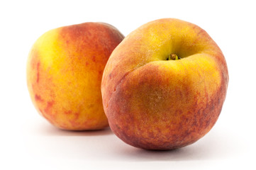 Ripe peach fruit isolated on white background