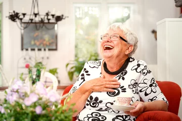 Fotobehang Elderly Lady in her Living Room © Ingo Bartussek