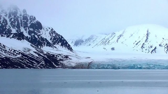 view of the landscape of the glaciers and icebergs in the svalbard islands
