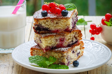 Summer dessert. Homemade pie with blueberries and currants
