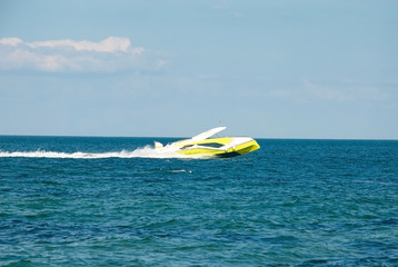 Yellow private pleasure boat