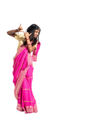 Beautiful young indian woman dancing isolated on white backgroun © ramoncarretero