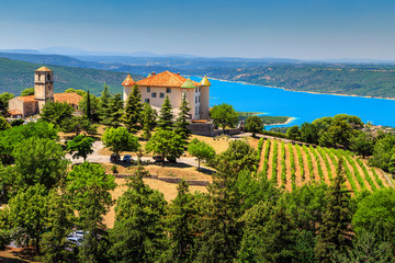 Aiguines castle with St Croix lake in background,Provence,France,Europe