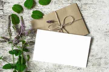 Blank greeting card and envelope with bouquet of wildflowers