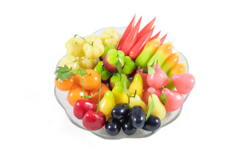 Coloful of Thai style marzipan fruits on dish isolate on white b