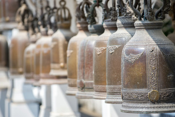 line of bell in temple , Thailand with selective focus and blurr