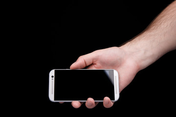 Hand holding smartphone