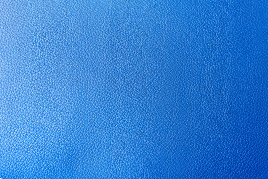 The leather texture background in the light-blue tone