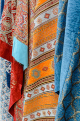 Traditional Turkish fabric hanging vertically. Several varieties.