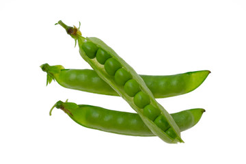 Fresh green peas on a white background