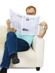 Naklejka premium man reads the news in the newspaper