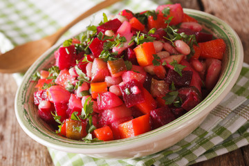 Salad of boiled vegetables in a bowl macro. horizontal
