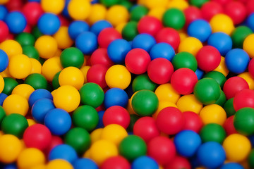 Fototapeta na wymiar Toy balls of different color - backdrop