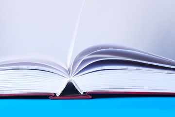 Open book on light table. Back to school. Copy space