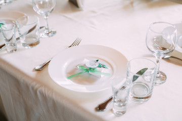 Wedding Candy-box Lies On A Plate. Bomboniere Is Part Of Decorat