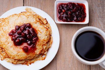 Pancakes, jam and coffee