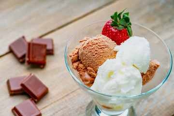 Ice cream sundae, chocolate and strawberry