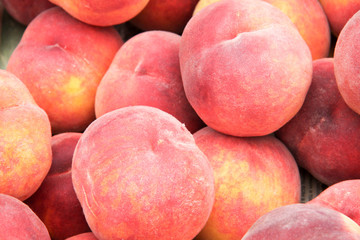 peaches on the counter market as a background
