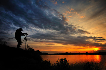 Photographer at sunset