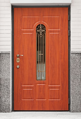 Brown front door - entrance to the building