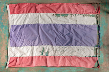 Thailand flag / Old Thai flag on old wood background. Top view. Flat lay.