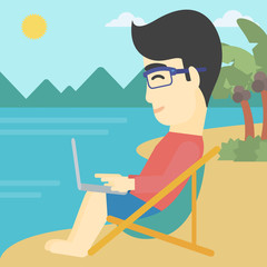 Obraz na płótnie Canvas Businessman working on laptop on the beach.
