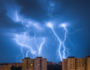 Many Lightnings Over Housing Estate. Night Storm in the City.