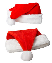 Obraz na płótnie Canvas Christmas Santa Claus red hats on white