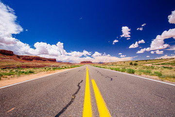 Highway 163, an endless road, Agathla Peak, Arizona, USA
