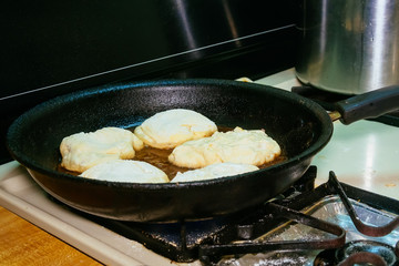 cooking deep fried meat pies