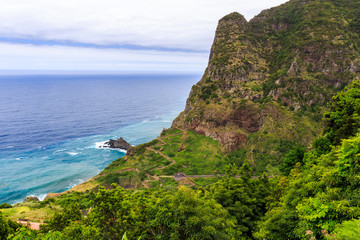 Amazing view of mountains and ocean on the northern coast of Madeira near Boaventura, Portugal