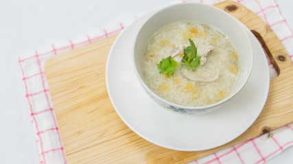 Thai style rice boiled with pork in bowl