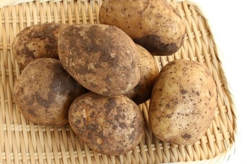 Freshly Harvested Potatoes on White Background