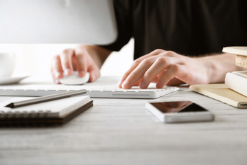 Businessman working on computer indoors