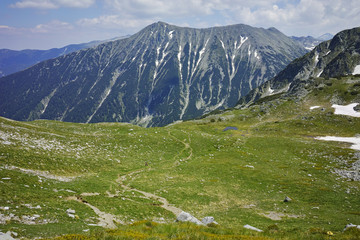 Fototapeta na wymiar Green hils of Todorka peak, Pirin Mountain, Bulgaria