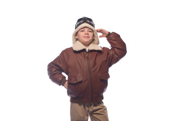 the boy is an aviator in the jacket of the pilot and in old glasses