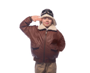 the boy is an aviator in the jacket of the pilot and in old glasses