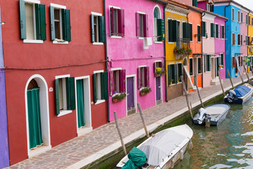 Colorful homes along canal in Burano, Italy