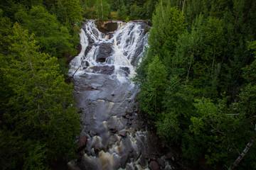 Fototapeta premium Eagle River Waterfall In Michigan. Eagle River Falls is one of the largest waterfalls in the Keweenaw and is view able from the road. 