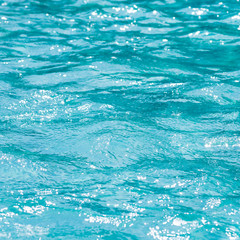 Abstract blur of swimming pool water surface