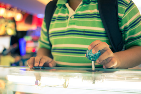 Close up hand control joystick of arcade,Vintage tone