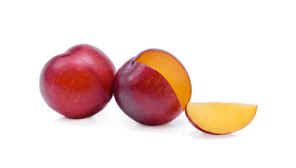 Red plum fruit isolated on white