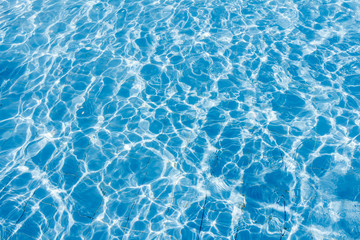 Surface of swimming pool water background