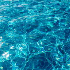 Surface of swimming pool water background