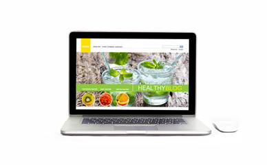 Laptop with healthy website on the screen on isolated white background